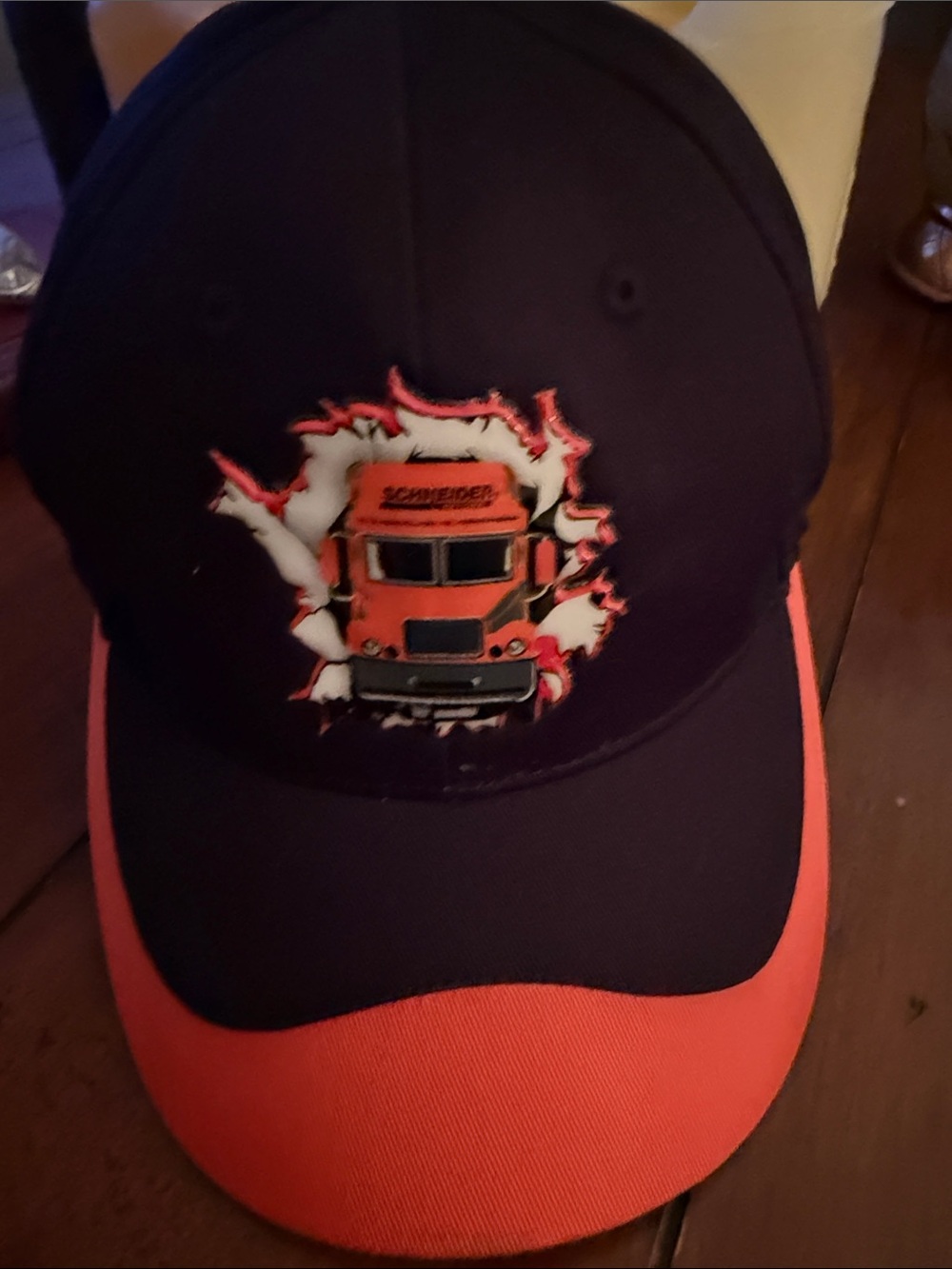 Schneider men’s ' Navy and Orange Truck Baseball Cap